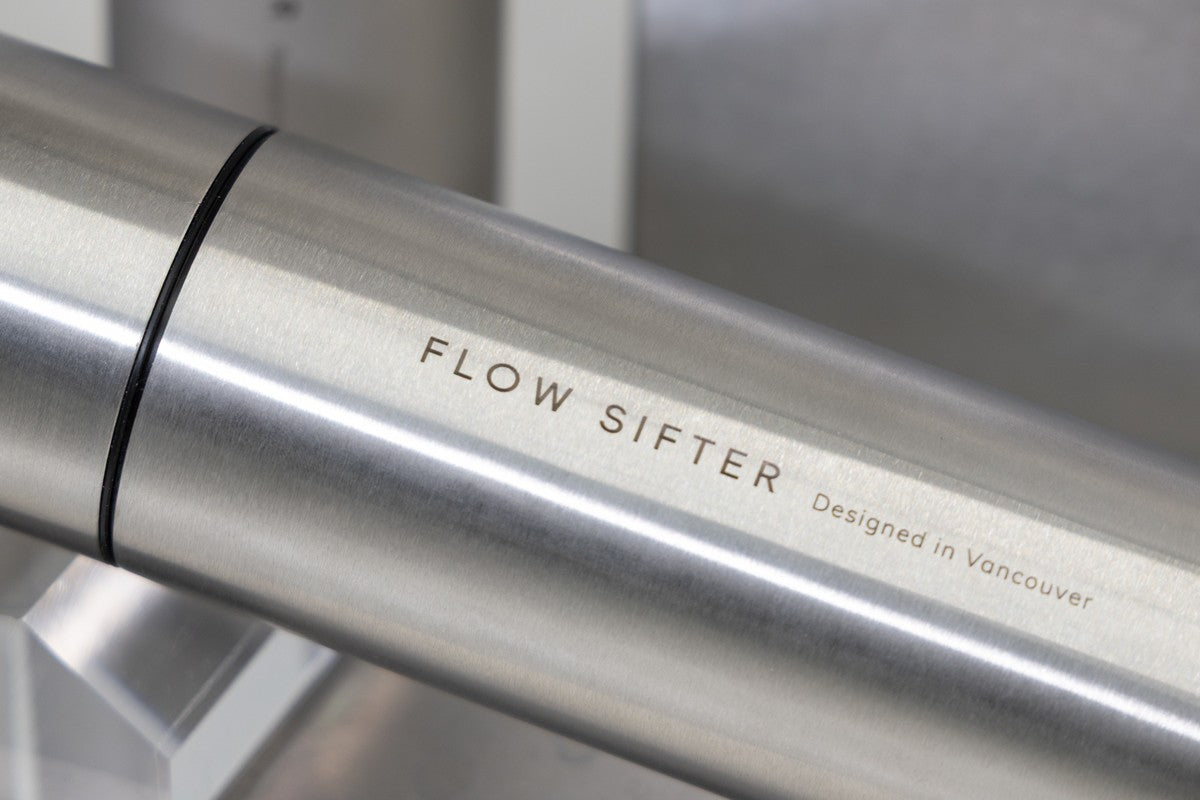 Close-up of the brushed stainless steel finish and Flow Sifter logo